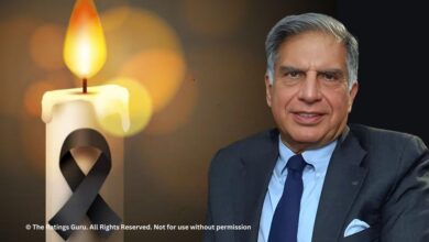 Image of Ratan Tata, dressed in a suit, alongside a lit candle with a black ribbon symbolizing mourning, related to Ratan Tata passed away.